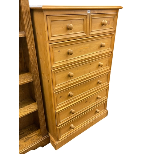 400 - Pine chest of two short above five long drawers, 141cm by 87cm by 44cm.