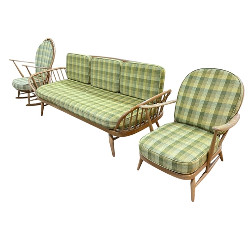 413 - Vintage Ercol Windsor three piece lounge suite comprising Studio couch, rocking chair and easy chair... 