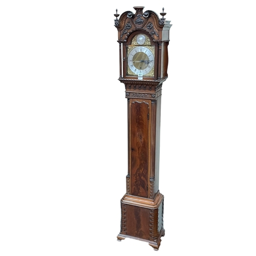 421 - Carved mahogany ¼ chiming grandmother clock, 173cm.