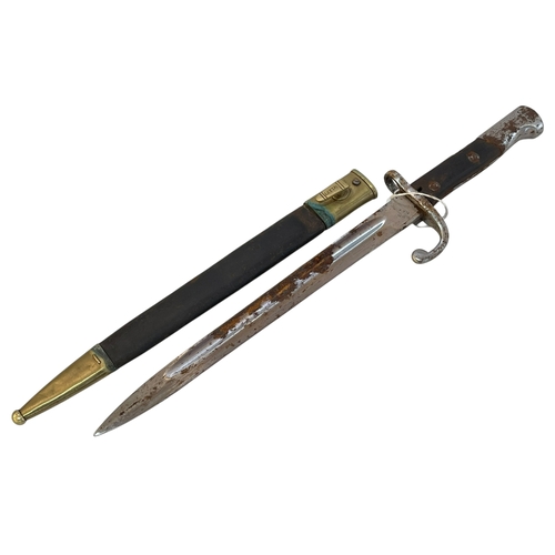 158 - Weyersberg Kirschbaum & Co Solingen bayonet and scabbard, handle reads EE1297. Blade is 30cm.