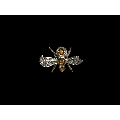 207 - Diamond and citrine, white and yellow gold insect brooch, hallmarked, 2.5cm across.