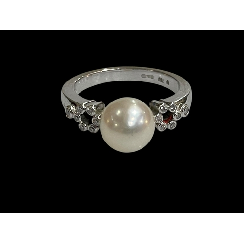 209 - Mikimoto pearl and fourteen stone diamond, 18 carat white gold ring, size M.