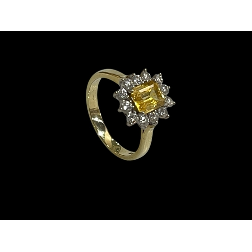 210 - Citrine and diamond 18 carat gold ring having rectangular yellow citrine border with twelve brillian... 