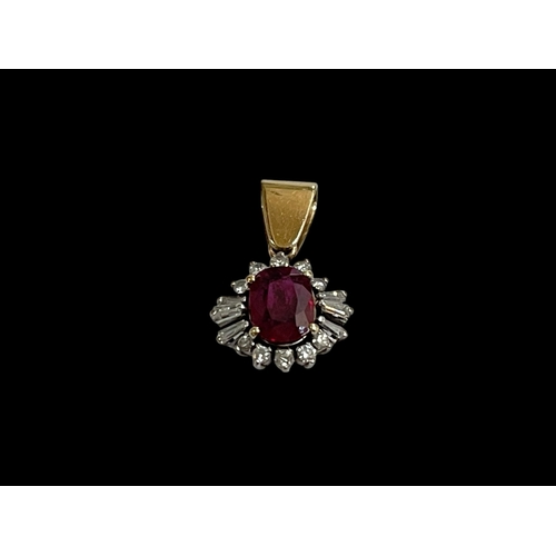 213 - Ruby and diamond white and yellow gold pendant.