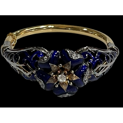 215 - Impressive 18 carat gold, diamond and blue enamel bangle, having elevated 0.25 carat diamond at the ... 