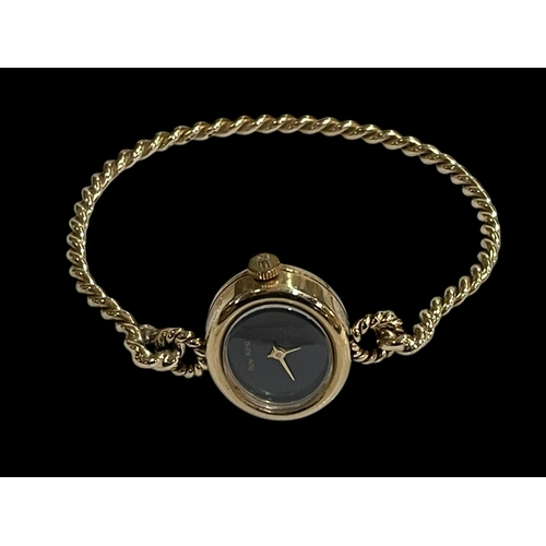 216 - Roy King 9 carat gold vintage ladies twist bangle watch.