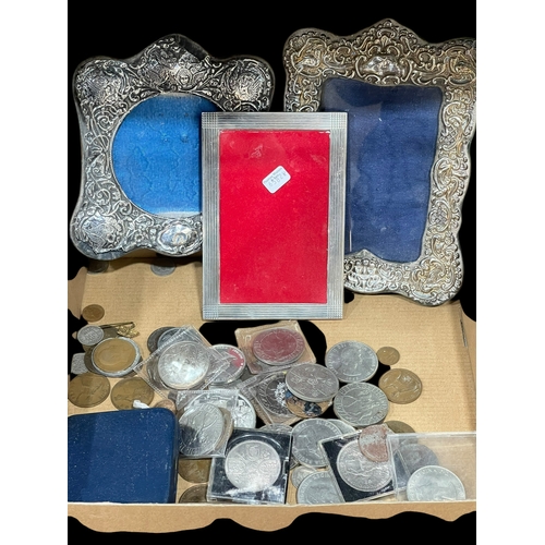 228 - Three silver photograph frames and various coins.