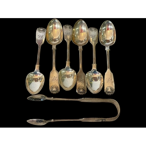 249 - Newcastle silver six fiddle and shell teaspoons and tongs, 1869/70.