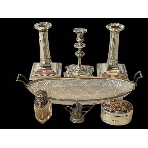 255 - Interesting collection of six silver items comprising of taperstick, pair candlesticks, boat shaped ... 