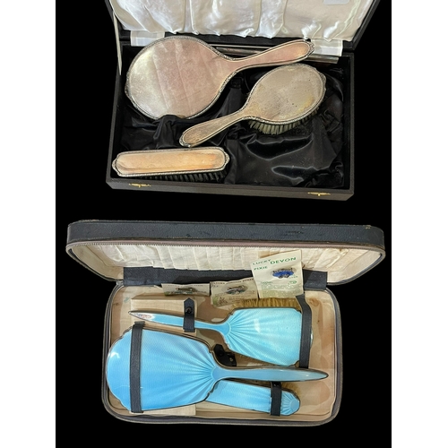 258 - Silver and blue enamel brush set, three Lucky Devon Pixies, and engine-turned silver brush set.