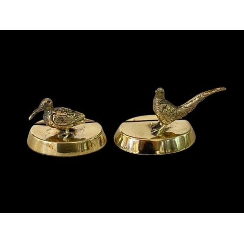 261 - Pair silver gilt menu holders, London 1907, 3.75cm across.