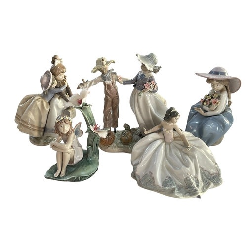 287 - Five boxed Lladro including Scarecrow and the Lady', 'Sharing Secrets' and 'At the Ball'.