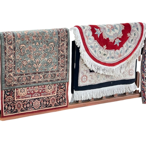 319 - Collection of eleven various rugs and prayer mats including three antique rugs, two Chinese, etc.