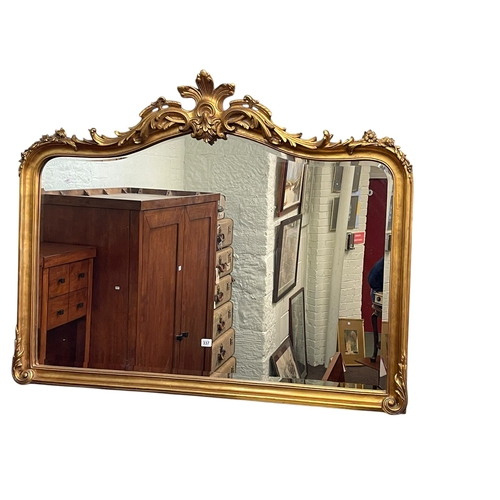 337 - Laura Ashley gilt framed bevelled overmantel mirror, 99cm by 126cm.