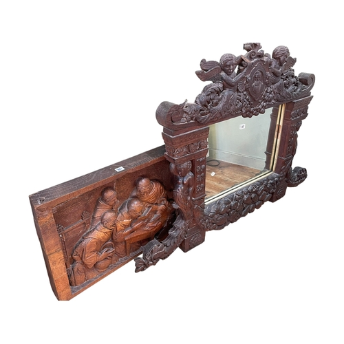 357 - Victorian carved oak framed overmantel mirror and carved oak plaque depicting four monks amused at a... 