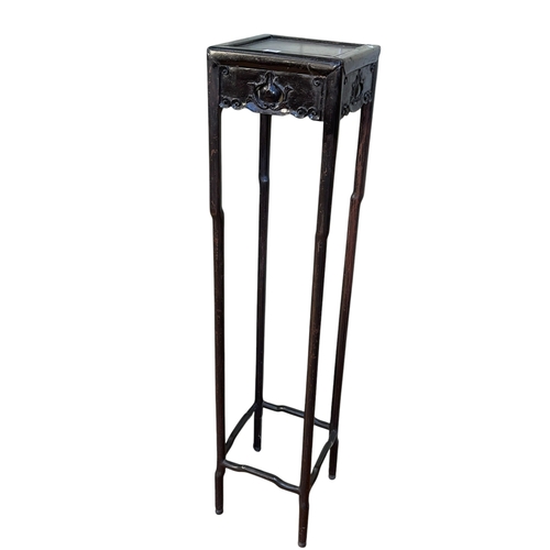 369 - Tall Oriental plant stand and pair Oriental plaques with applied decoration (3).