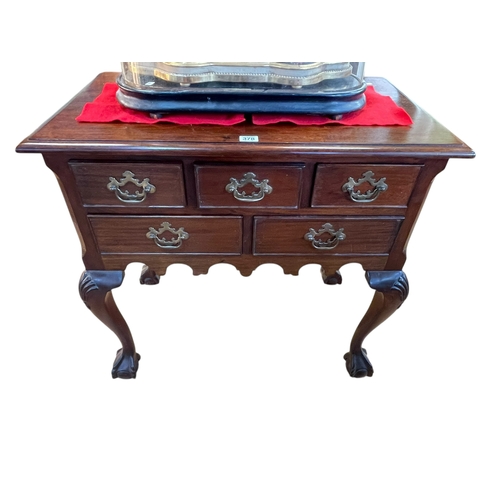 378 - Reproduction mahogany five drawer lowboy on ball and claw legs, 72cm by 77cm by 45cm.