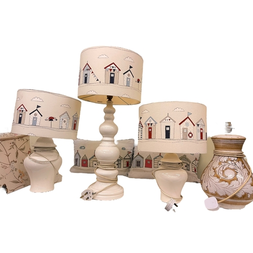 83 - Three standard lamps and shades, collection of table lamps, ceiling candle light and cushion.