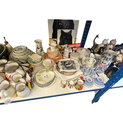 88 - Large collection of assorted china including commemorative wares, cat ornaments, Continental pottery... 