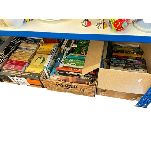 89 - Seven boxes of mostly cricket related books including some signed, Wisden's, player cricket annuals.