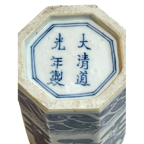 105 - Chinese blue and white octagonal vase decorated with figures, Daoguang mark to base, 12cm.