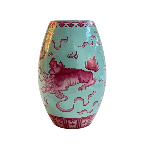 107 - Chinese pottery vase decorated with pink dogs of fo on light blue ground, red seal mark to base, 17c... 