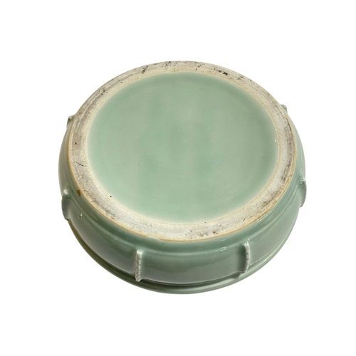 121 - Chinese Celadon Tulip vase designed as seven small bulbous vases in circular bowl, 17cm.