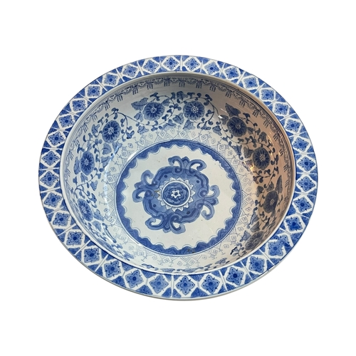 122 - Large Chinese blue and white pottery bowl with outer landscape and inner floral design, 36.5cm.