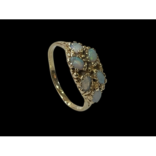 158 - 14 carat gold six stone opal ring, size U.