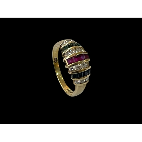 167 - 14 carat gold, sapphire, ruby, emerald and diamond band ring, size N.