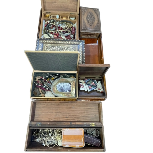 21 - Carved wood boxes, Middle Eastern inlaid box, assorted jewellery, etc.