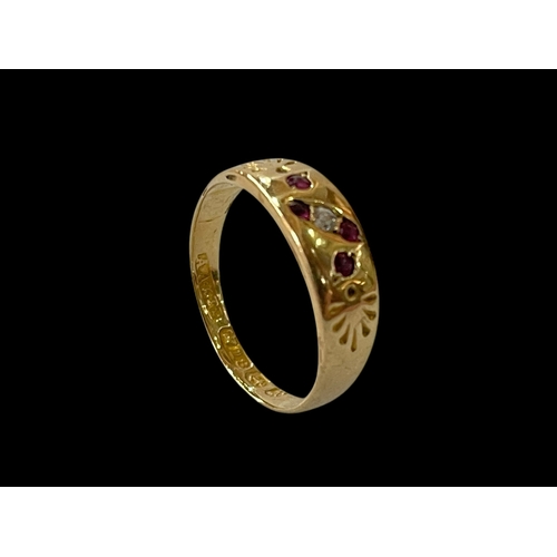 153 - Late Victorian ruby and diamond gypsy set 18 carat gold ring, size L.