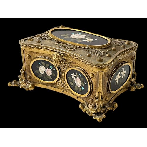 190 - Continental gilt casket with Pietra Dura oval panels, 16.5cm across at feet.