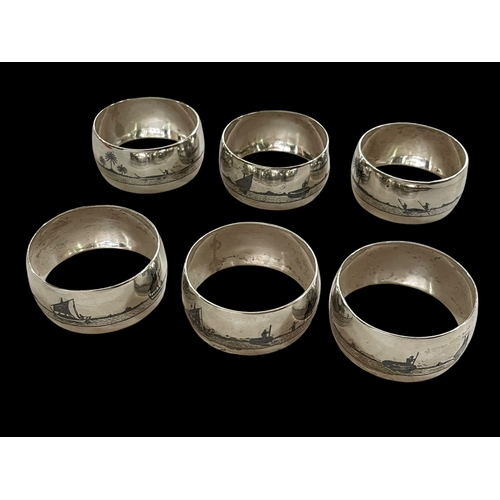 223 - Set of six Egyptian silver napkin rings.