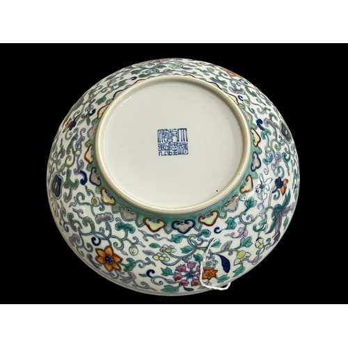 249 - Chinese shallow dish with bouquet decoration, blue seal mark, 20cm diameter.