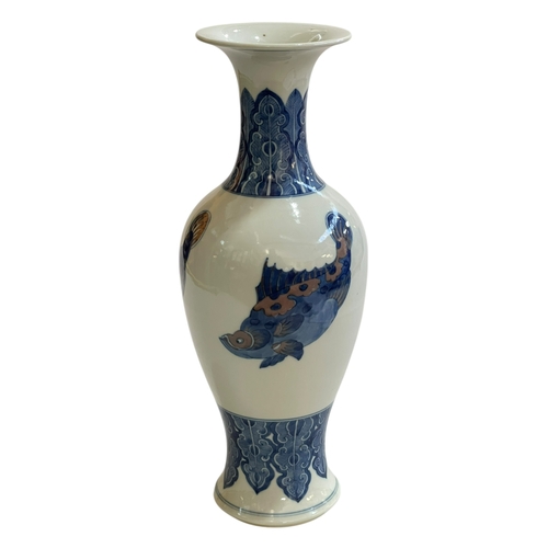 114 - Chinese pottery vase decorated with fish, 34cm.