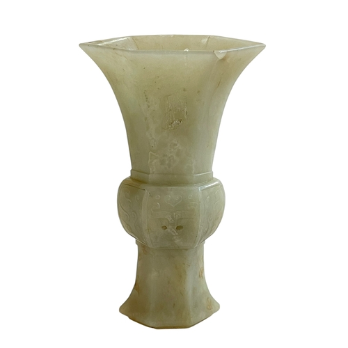 124 - Qing Dynasty jade gu vase together with a small wood stand.