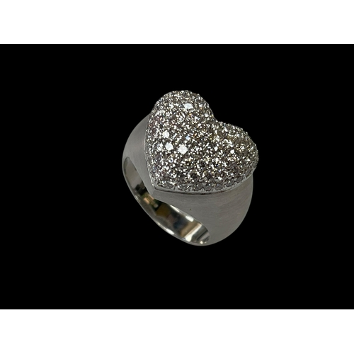 134 - 18 carat white gold heart shaped diamond pavé ring, size M.