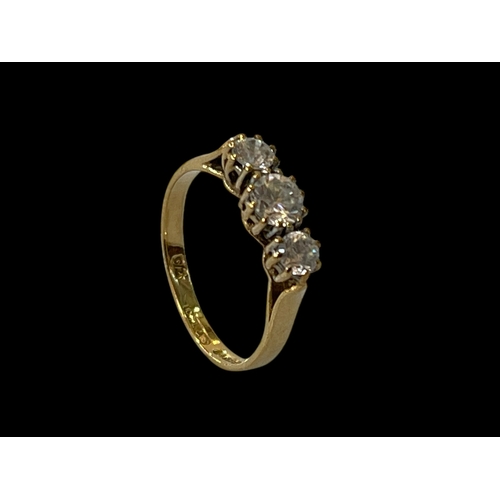 145 - Diamond three stone 9 carat gold ring, total diamond weight approximately 0.5 carats, size K.