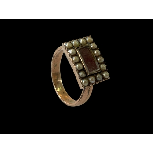 162 - 19th Century gold mourning ring with seed pearls, size I.