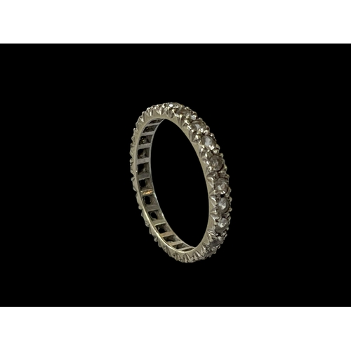 169 - Diamond set 9 carat white gold eternity ring, size Q.