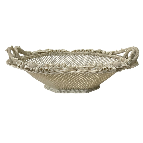 241 - Belleek basket, 33cm across.