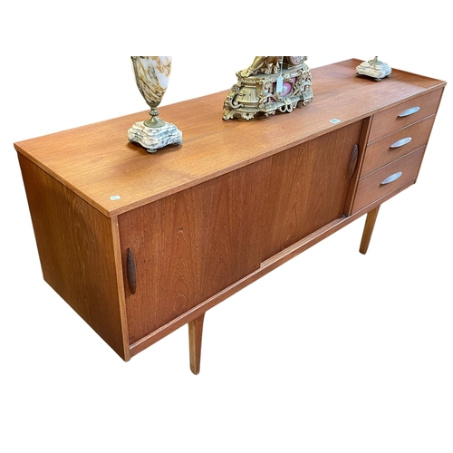 339 - Mid Century Austinsuite teak six piece dining suite comprising three drawer sideboard with two slidi... 