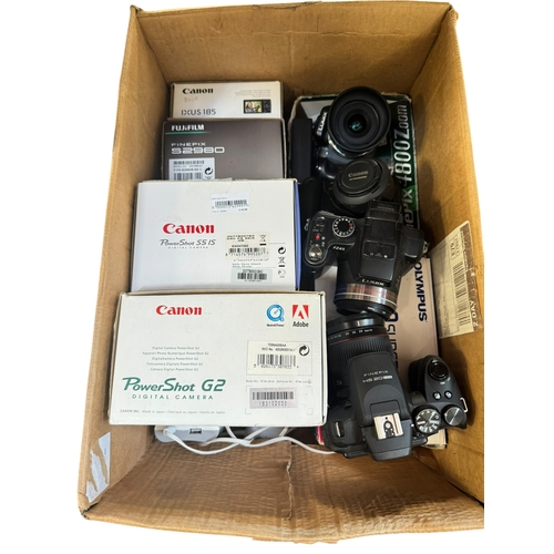 Box of digital cameras including Canon IXS 185, Panasonic G5, etc.