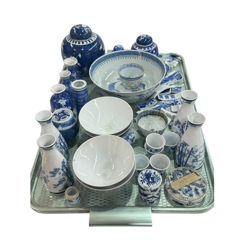 16 - Collection of Oriental blue and white china including Chinese prunus ginger jars and vases.