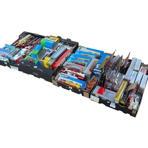 28 - Four boxes of die-cast and model fire engines, etc.