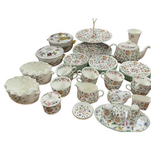 40 - Minton Haddon Hall part service including cakestand, teapot, cups, saucers and plates, bowls, two pl... 