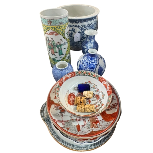 45 - Oriental blue and white planter and three vases, Chinese cylindrical vase, Imari and other plates, t... 