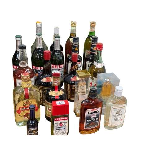 61 - Bottles of spirits including Lambs Navy Rum, Pernod, Tia Maria, Southern Comfort, etc.