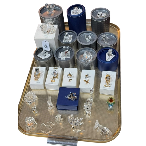 13 - Tray lot of twenty seven Swarovski pieces including boxed items and classics.